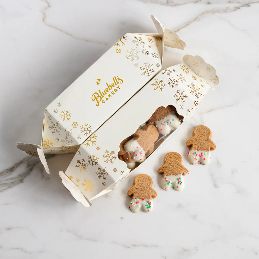 Gingerbread people biscuits and a Christmas cracker shaped box 