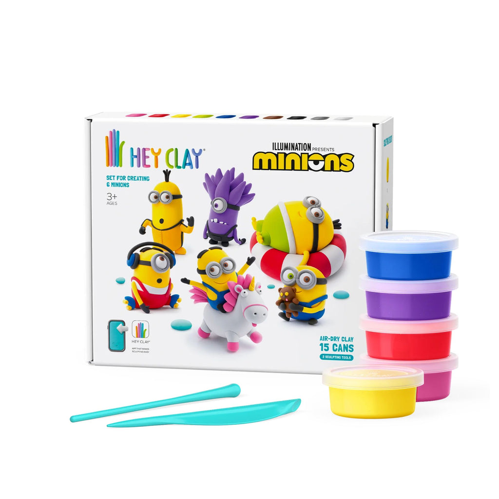 A white box with 6 various minions on it with 5 pots of clay in various colours and two clay tools