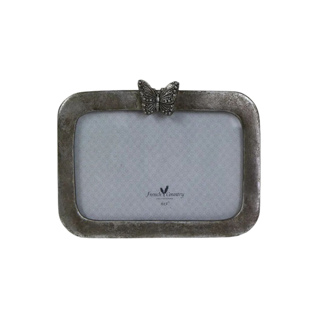 Butterfly Photo Frame - Horizontal 6x4". Antique silver photo frame with a small butterfly at the top centre