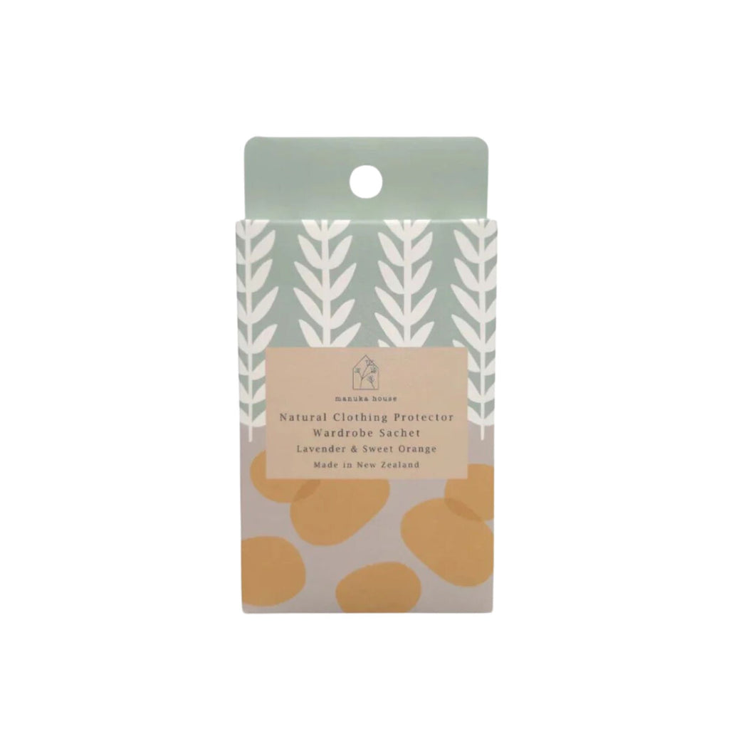 Green, yellow, white and grey patterned package labelled "natural clothing protector wardrobe sachet"