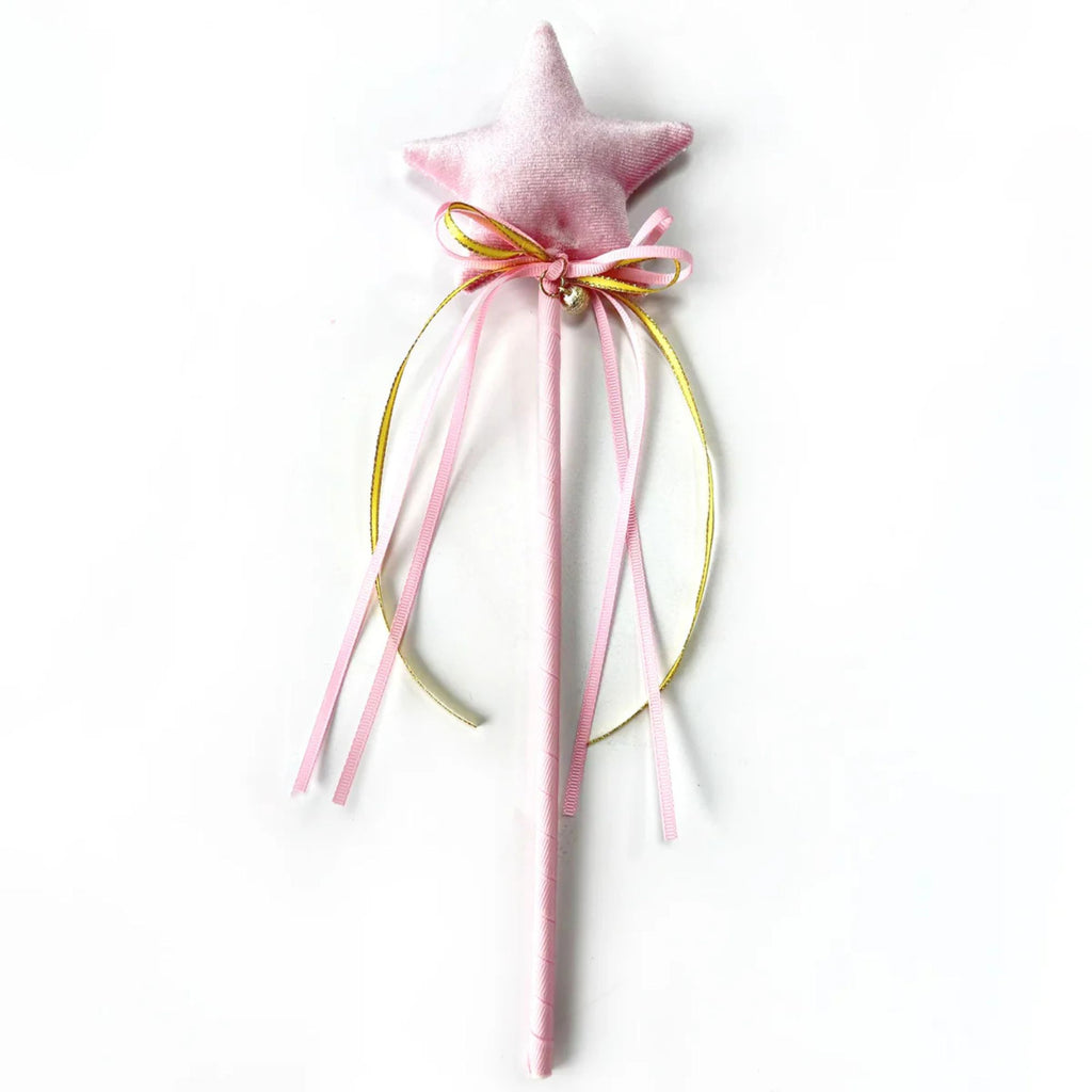 pink velvet star wand with pink and gold ribbon on a white background