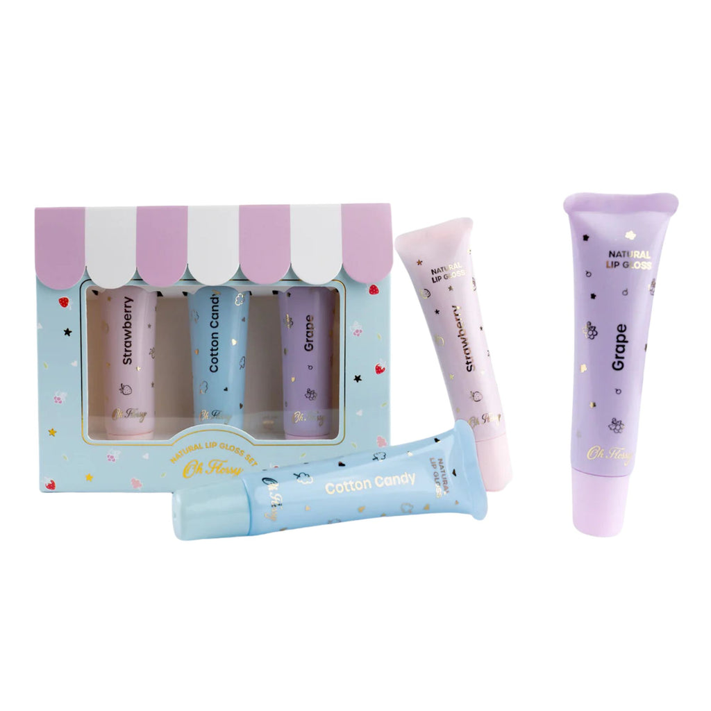 Set of 3 kids lip balm tubes in three colours. Presented in a box against a whtie background