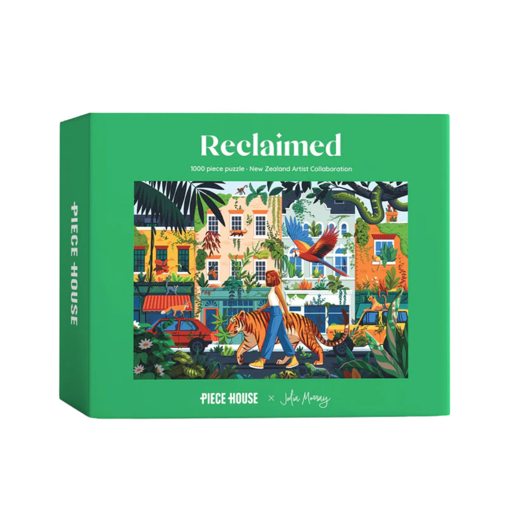 PieceHouse - Reclaimed - 1000 Piece Puzzle. Green box with image of a lady walking a tiger down a street