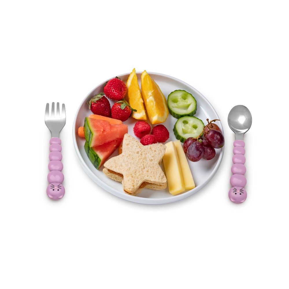 A purple cat fork and spoon set with a plate of snacks