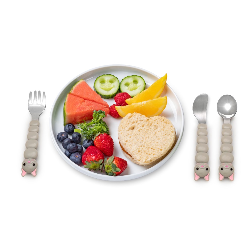 A grey bulldog fork, knife and spoon set with a plate of snacks