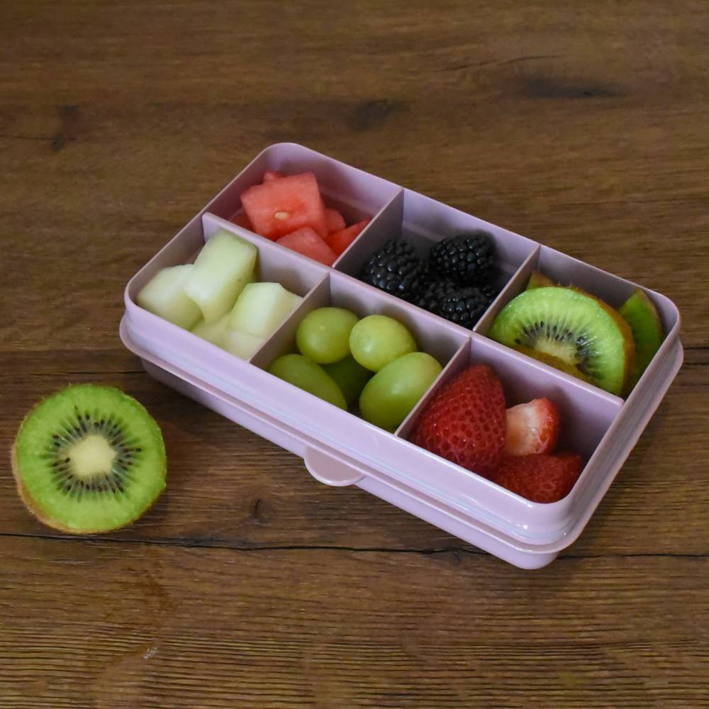 Pink 6 compartment open lunch box with fruit inside