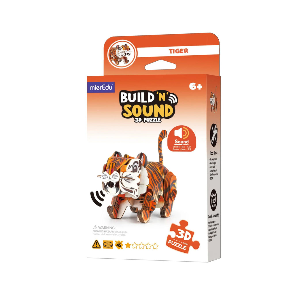 A orange and white ombre box labelled "build 'n' sound 3D puzzle with a cardboard 3D tiger puzzle on it