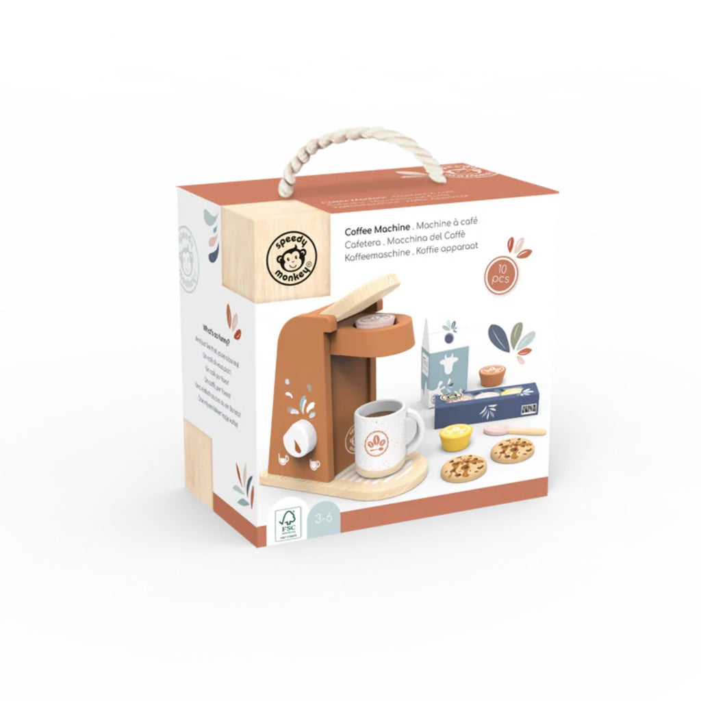 A box for a wooden set with a picture of a wooden toy set of a coffee machine including a mug, three coffee pods, a spoon, milk and two cookies on the front with a handle 