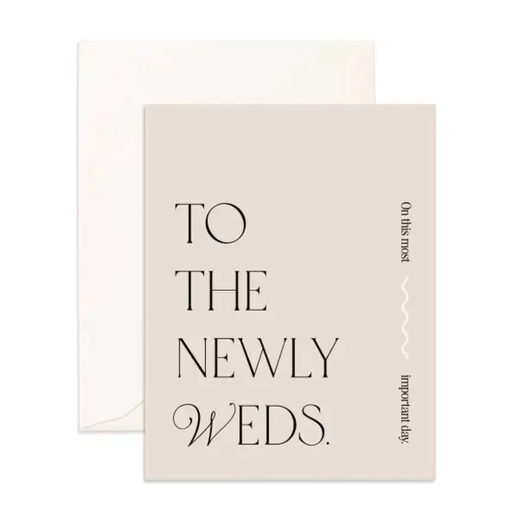 Light grey card and envelope reading "to the newly weds"