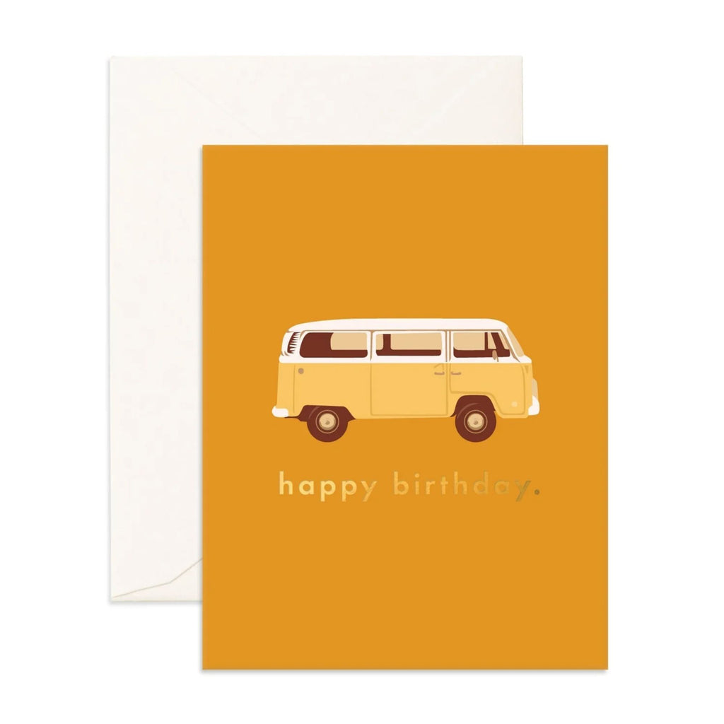 mustard greeting card with a combi van reading "happt birthday" in gold text and an envelope