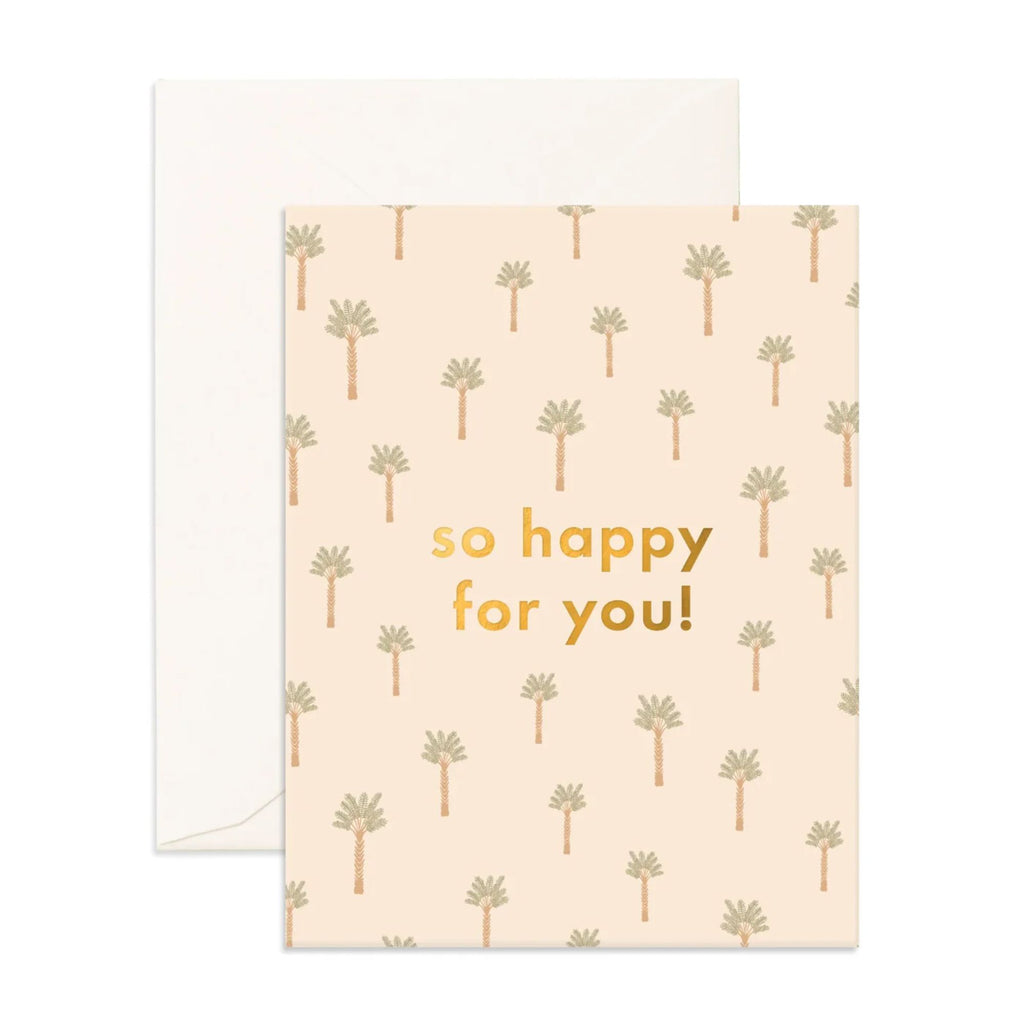 Beige greeting card with palm trees reading "so happy for you!" with an envelope