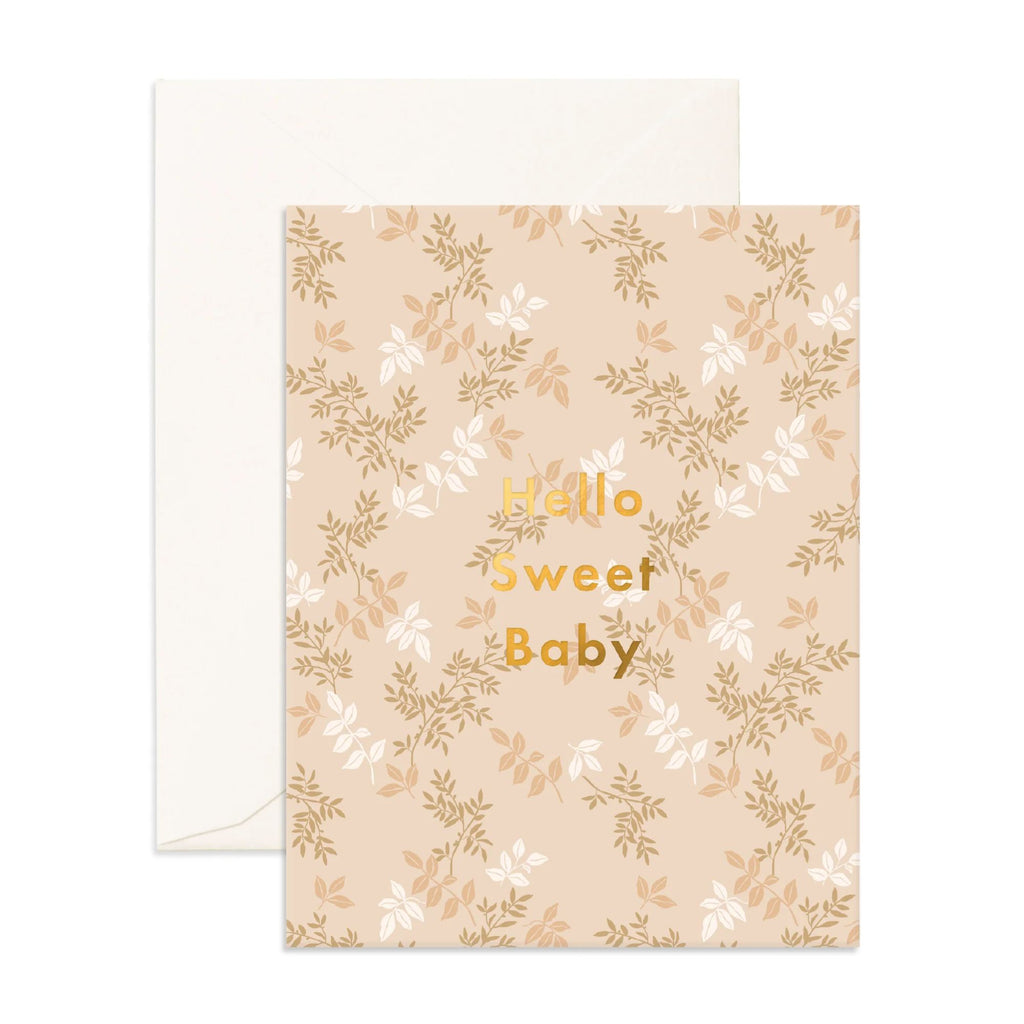 Light pink greeting card with flowers and foliage on it reading "Hello sweet baby" in gold text with an envelope