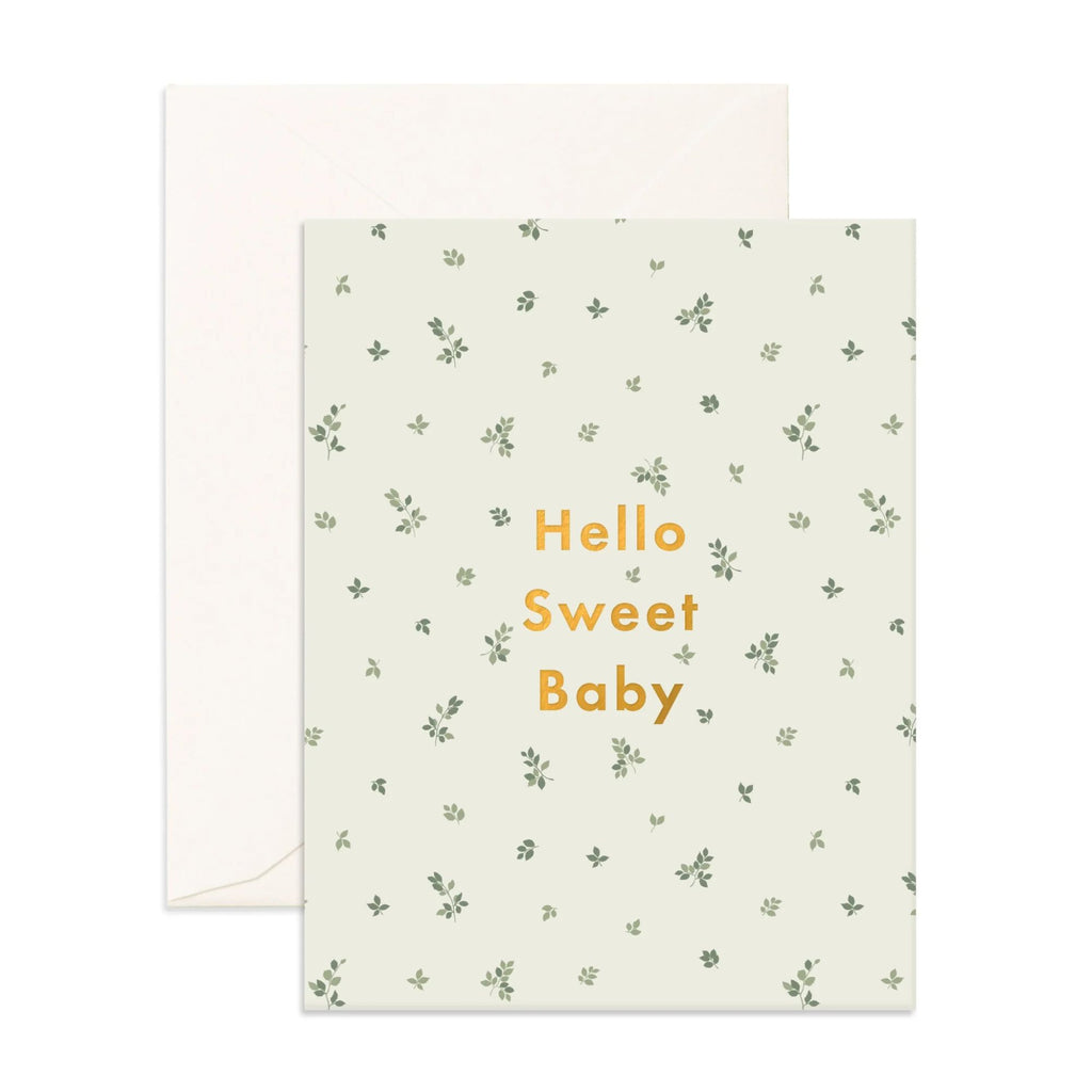 Light blue greeting card with foliage on it reading "Hello sweet baby" in gold text with an envelope