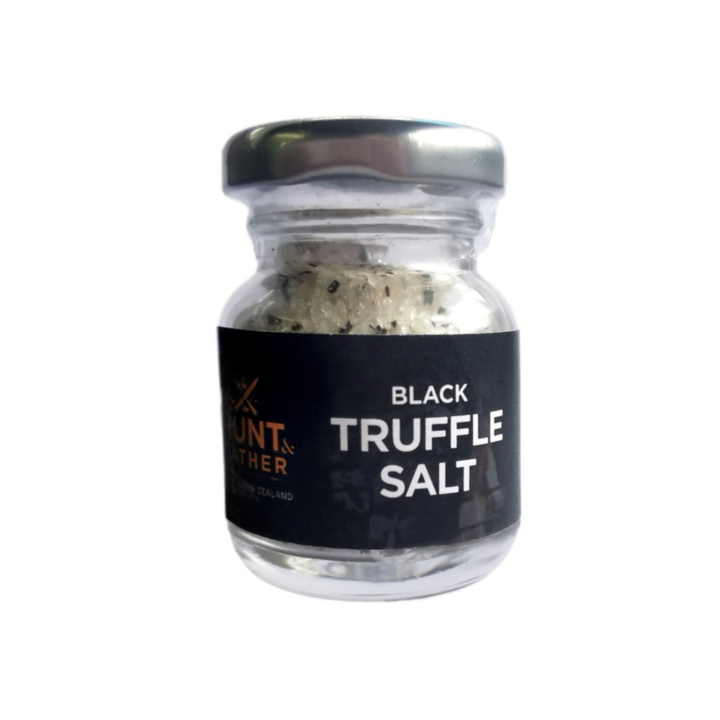 Hunt and Gather black truffle salt in a clear jar with silver lid and black label