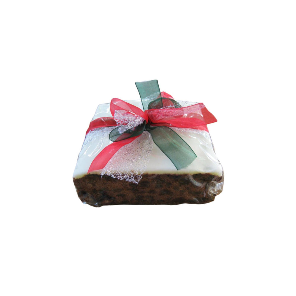 Christmas cake with a red and green bow