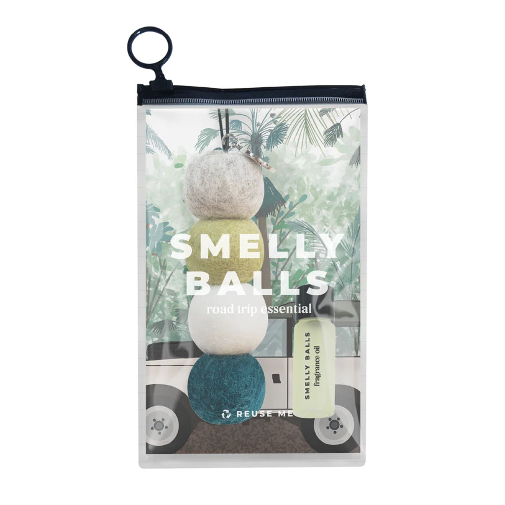 A clear pouch with a car air freshener composed of four felt balls in grey, green, white and blue on a string with a silver charm and a bottle of fragrance oil with a car illustration card behind them