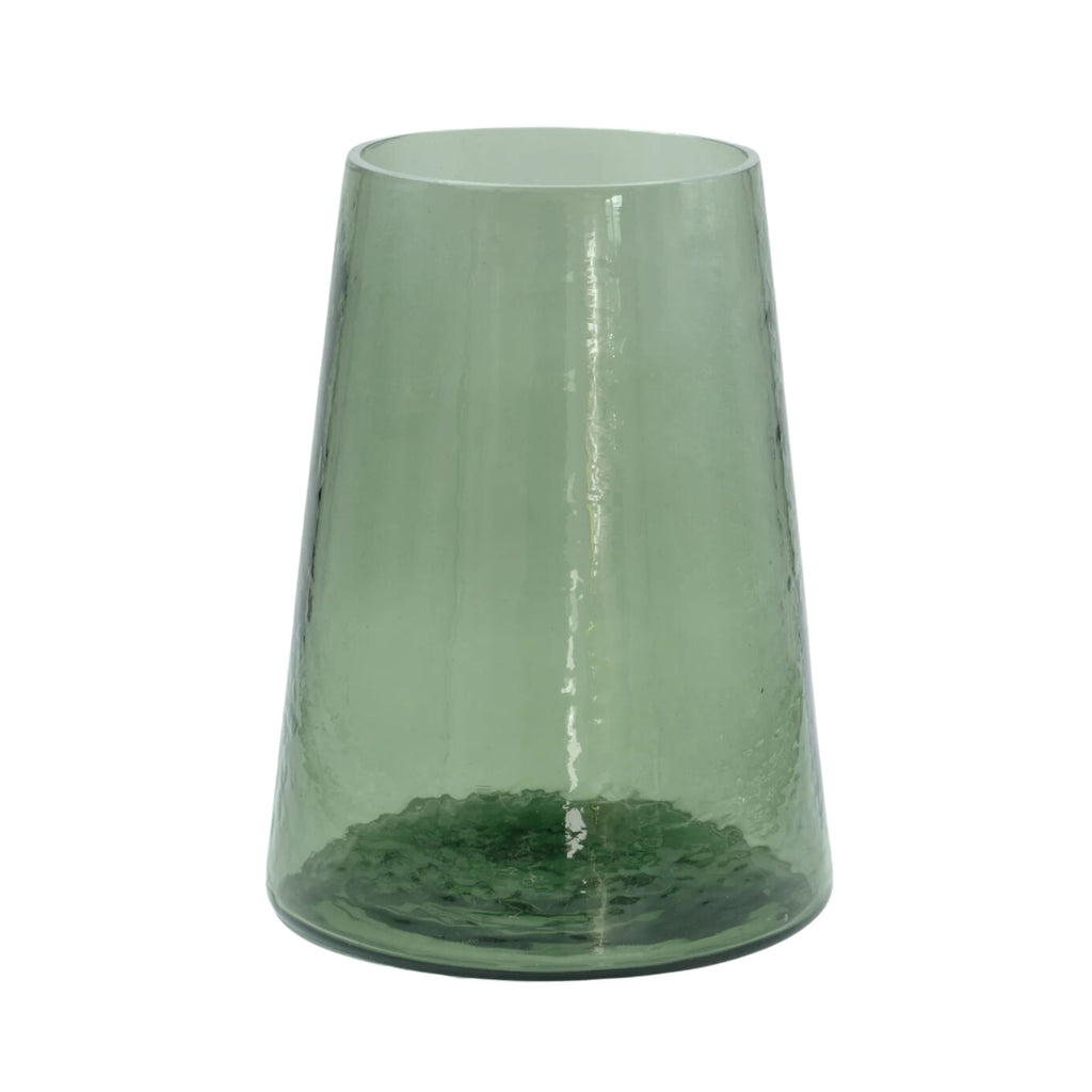 A green hammered texture glass flower vase with a arrow top and wide bottom against a white background