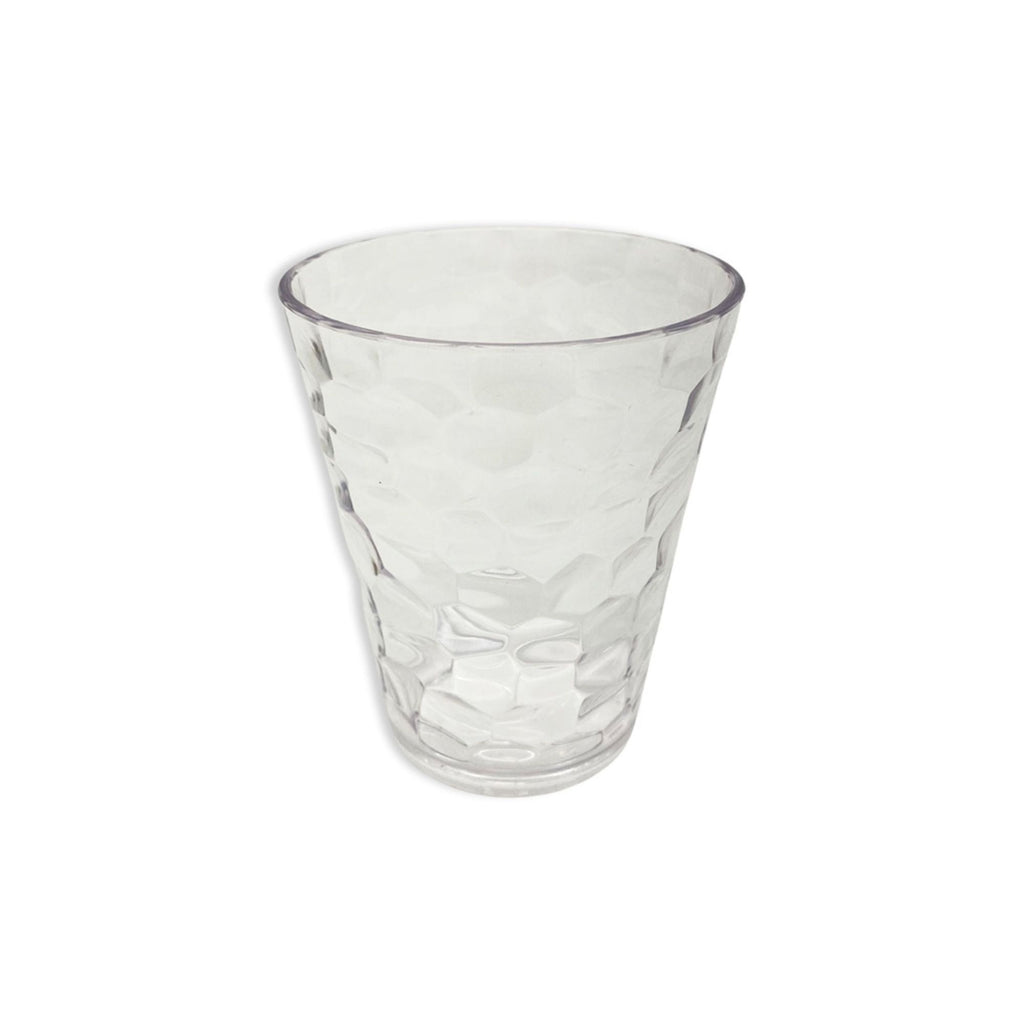 A transparent hammered acrylic drinking tumbler