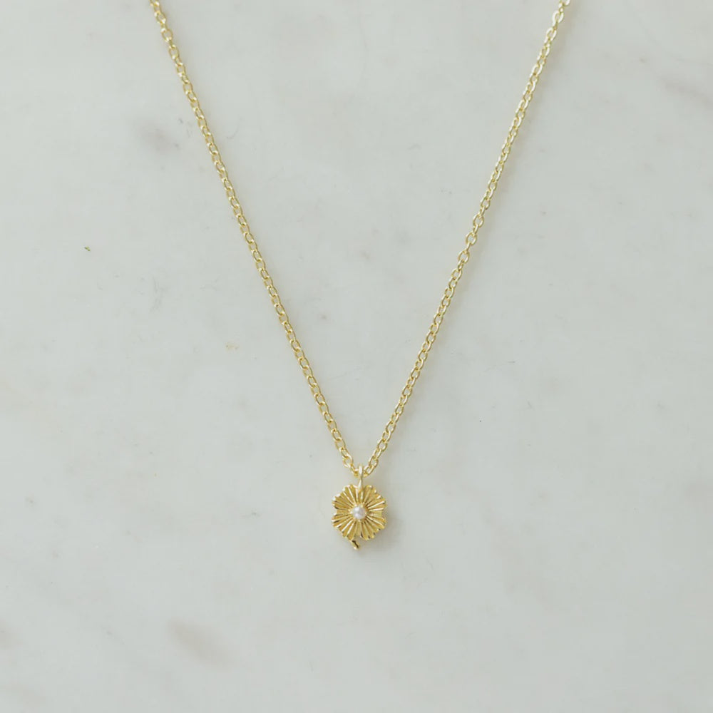 Gold Necklace with a flower pendant and pearl centre