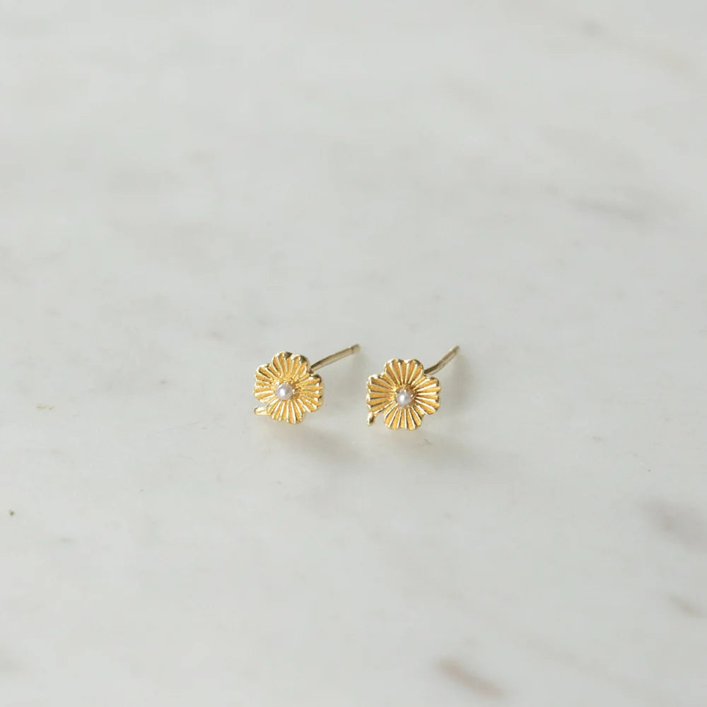 Gold flower studs with a pearl centre