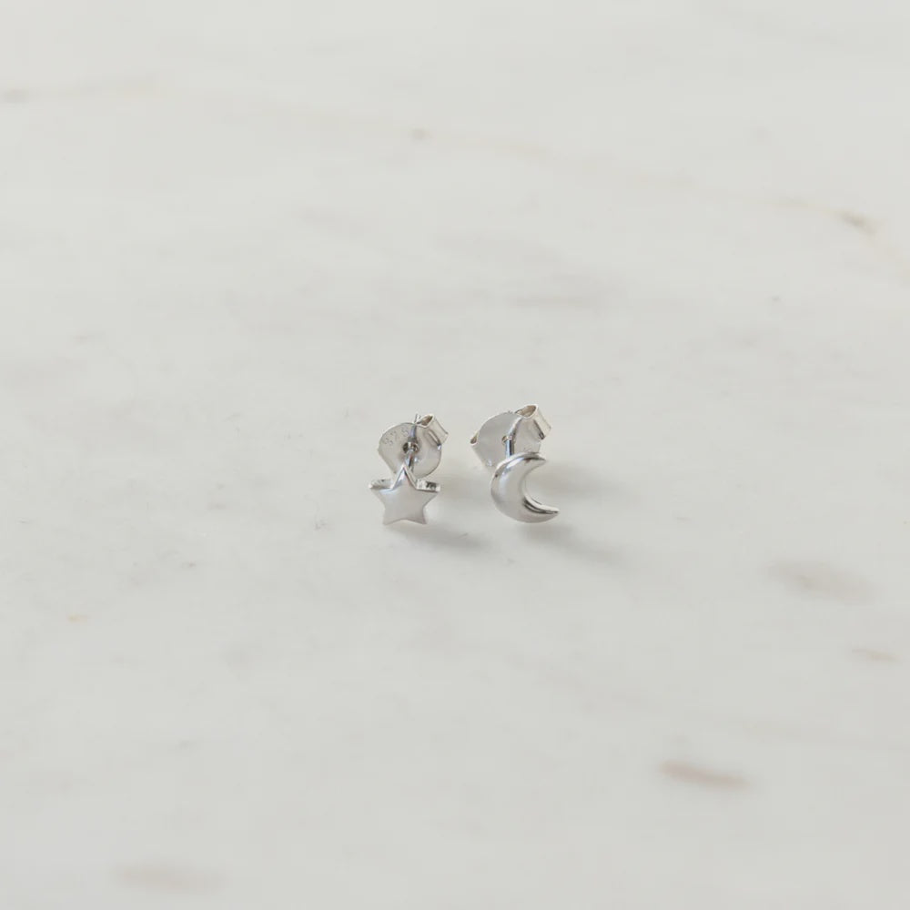 Silver stud  earring set of one star shape and one moon shape