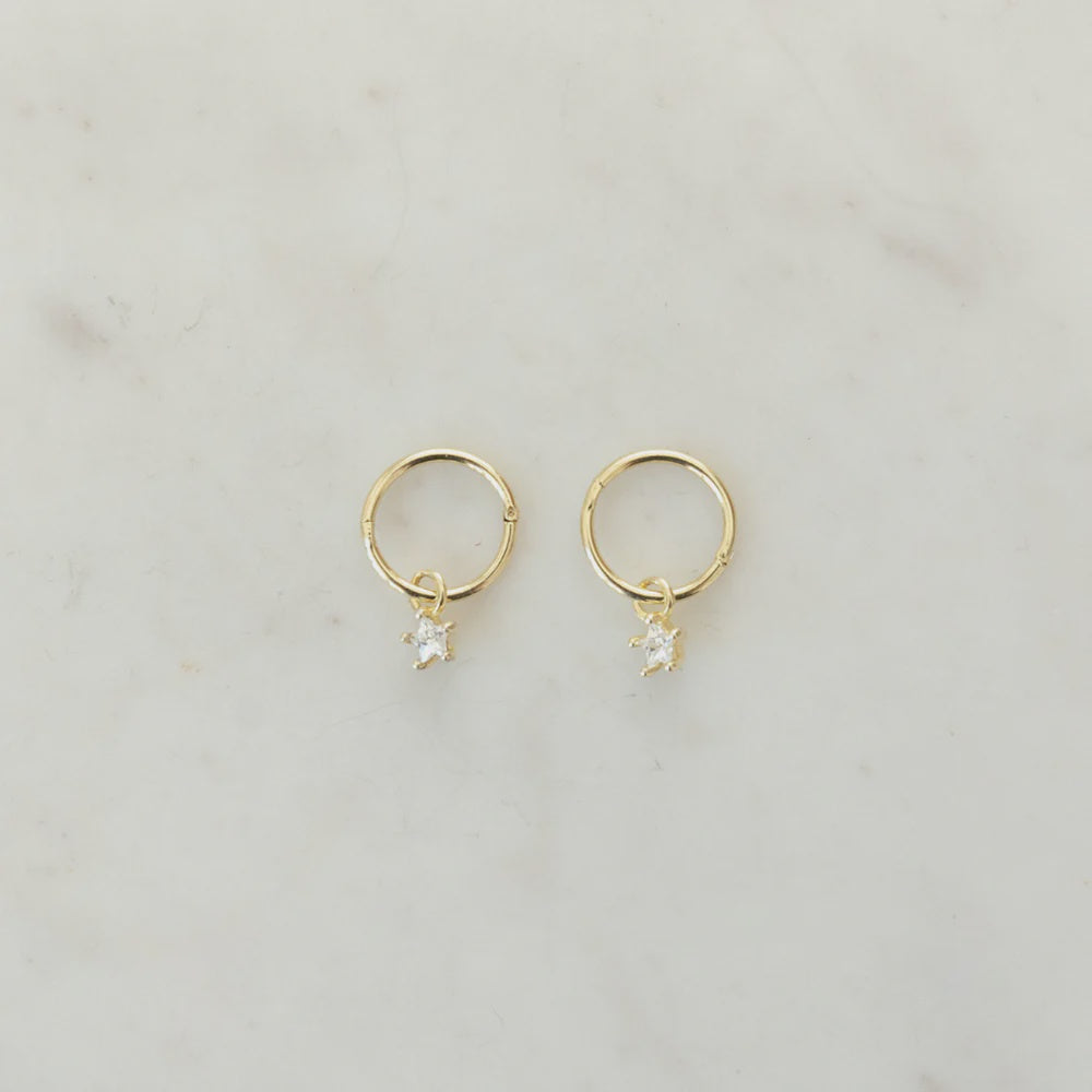 Gold hoop earrings with star shaped Zircons